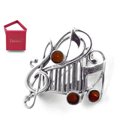 Broszka klucz wiolinowy z bursztynem